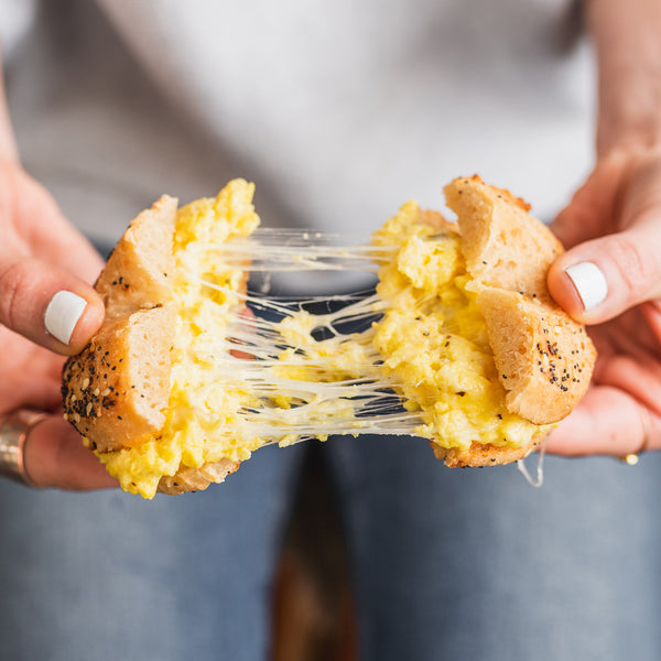 Cheesy Egg Breakfast Pagel - Bedrock Bakers