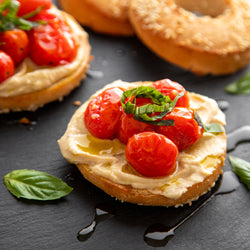 Sauteed Garlic Tomato Hummus on Sesame Pagel